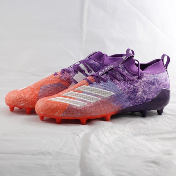 purple and orange cleats